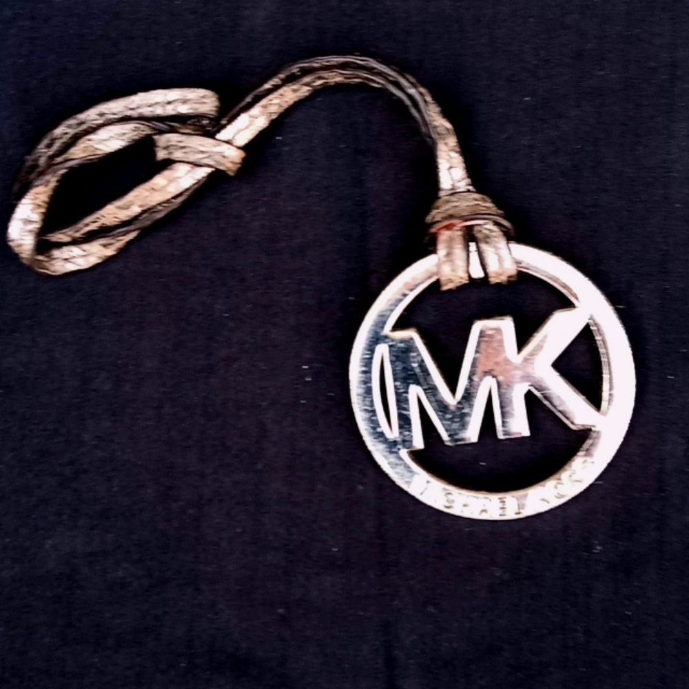 Michael Kors "MK" Silver Medallion w/ Metallic Silver Leather Strap